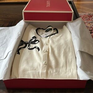 New Talbots summer sweater off white with back bow and trim.